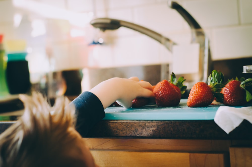 A colorful plate of fresh fruit for kids